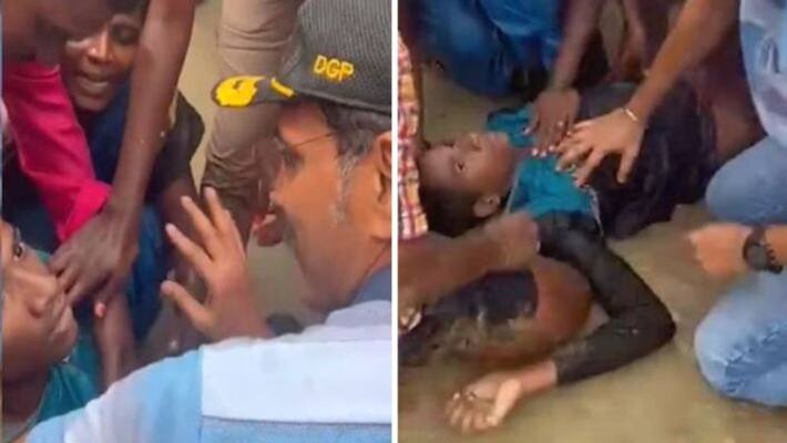 The boy who got caught in the wave in marina beach dgp sylendra babu giving first aid The boy who got caught in the wave in marina beach dgp sylendra babu giving first aid