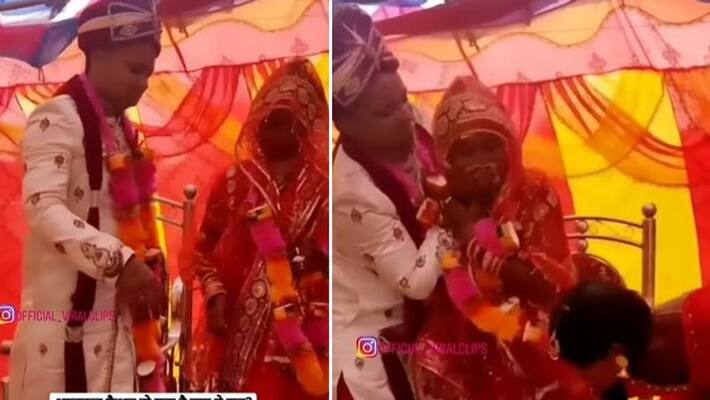 bride slaps groom as he forcefully trying to feed her laddu bride slaps groom as he forcefully trying to feed her laddu