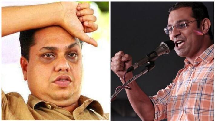 roji m john against an shamseer on rahulgandhi issue roji m john against an shamseer on rahulgandhi issue