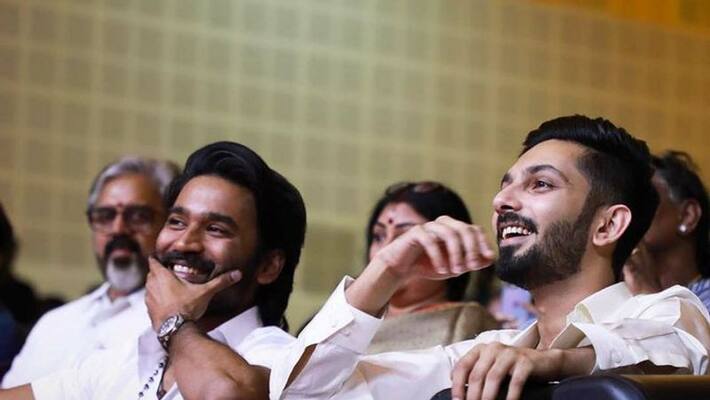 actor dhanush watching thiruchitrambalam movie with sons actor dhanush watching thiruchitrambalam movie with sons