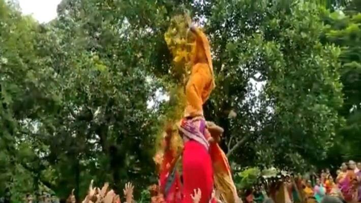 elderly woman participating in dahi handi on krishna janmashtami apa elderly woman participating in dahi handi on krishna janmashtami apa