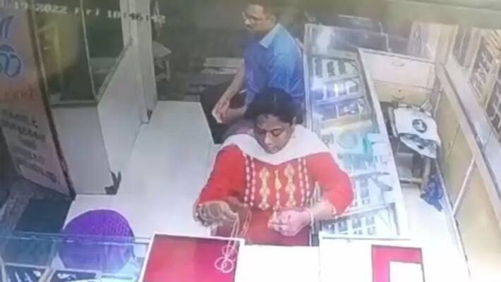 dmk ward secretary caught on cctv while stealing jewelry dmk ward secretary caught on cctv while stealing jewelry