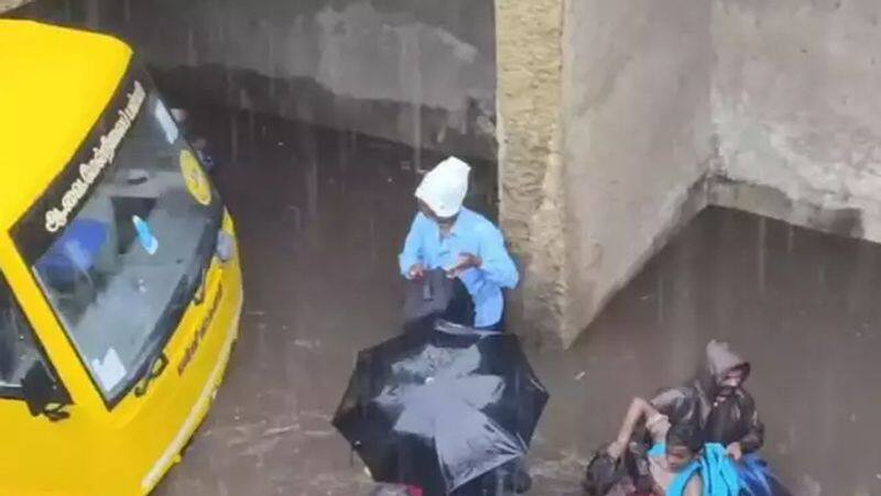 Heavy Rain.. School vehicle stuck in railway tunnel in kovilpatti