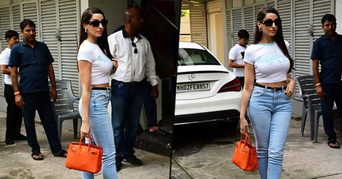Nora Fatehi Colourblocks Her Way In A White Tee, Blue Jeans And A
