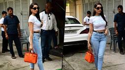 WATCH Nora Fatehi donned white crop top with blue denims; netizens trolled her for her walk RBA