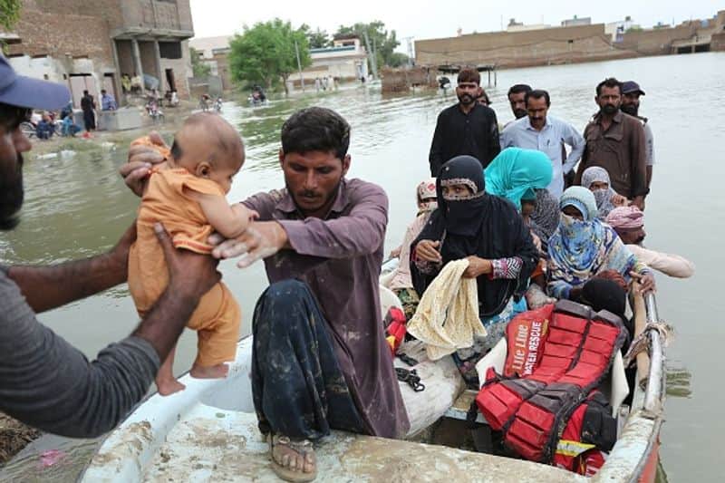 Flooding in Pakistan kills over 1,000 people in a "serious climate disaster"