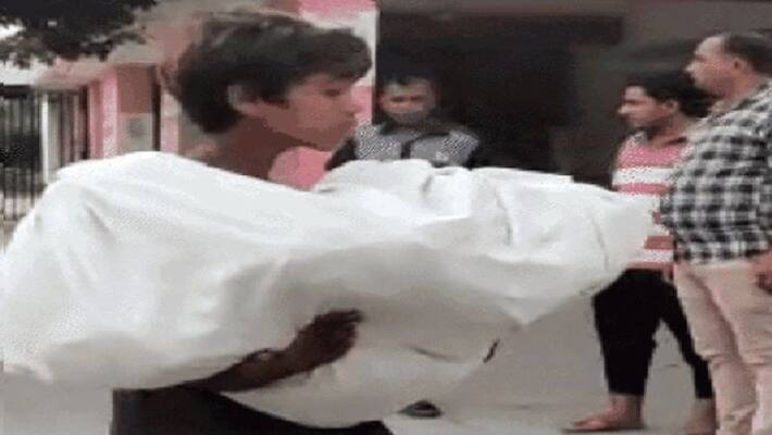 denied ambulance 10 year old boy carries baby brother dead body in uttar pradesh baghpat district ash denied ambulance 10 year old boy carries baby brother dead body in uttar pradesh baghpat district ash