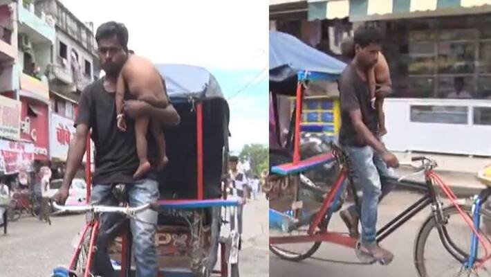Heart wrenching video of poverty, woman fle with another man, man carrying his infant son in shoulder while riding cycle rickshaw akb Heart wrenching video of poverty, woman fle with another man, man carrying his infant son in shoulder while riding cycle rickshaw akb