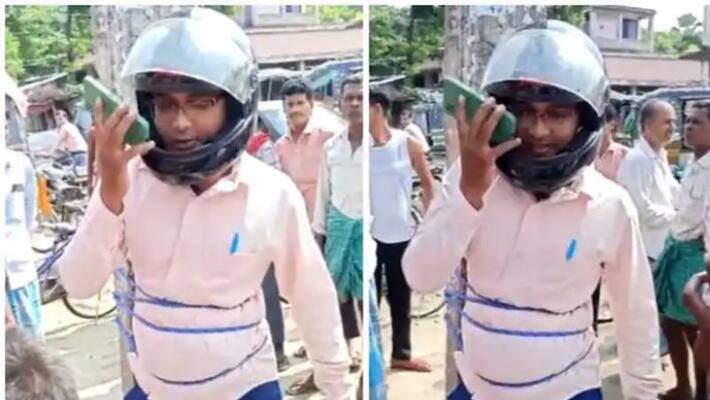 Bihar official tied to a pole for inflating the fertilizer prices viral video Bihar official tied to a pole for inflating the fertilizer prices viral video