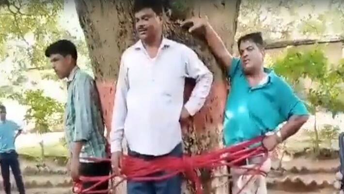 dumka news students tied teacher to a tree, beat up clerk and peon pwt dumka news students tied teacher to a tree, beat up clerk and peon pwt
