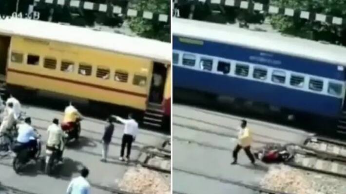 bike crushed under speeding train in railway level crossing, watch viral video akb bike crushed under speeding train in railway level crossing, watch viral video akb