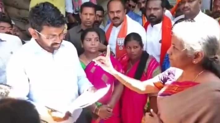 nirmala sitharaman pulls up collector over missing modi photo at telangana pds shops ash nirmala sitharaman pulls up collector over missing modi photo at telangana pds shops ash