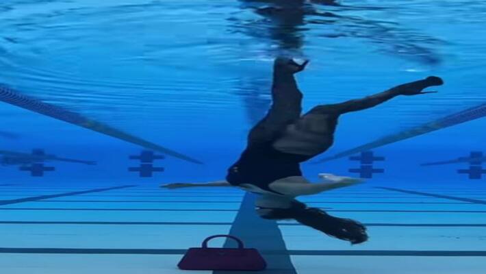Woman who walked upside down in swimming.. Video viral on internet Woman who walked upside down in swimming.. Video viral on internet