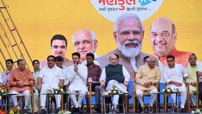 Home Minister Amit shah unveils 36th national games mascot and anthem at Ahmedabad ckm Home Minister Amit shah unveils 36th national games mascot and anthem at Ahmedabad ckm