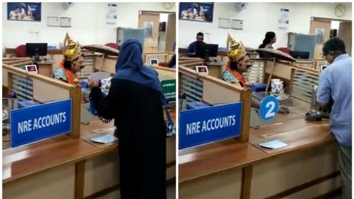 sbi employee came to branch in king mahabali getup.. se here viral video sbi employee came to branch in king mahabali getup.. se here viral video