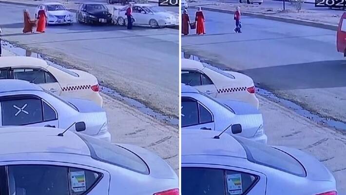 womans narrow escape from road accident womans narrow escape from road accident