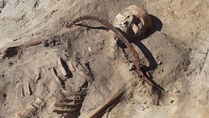 Grave of a Female Vampire with sickle across the neck found in Poland Grave of a Female Vampire with sickle across the neck found in Poland