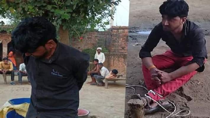 Sambhal Villagers tied pegs with animals all night lover who came meet his girlfriend got painful punishment Sambhal Villagers tied pegs with animals all night lover who came meet his girlfriend got painful punishment