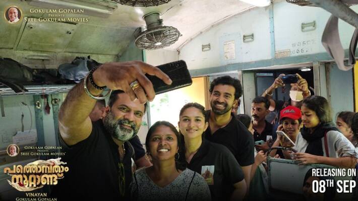 Actor Siju Wilson and costars travell in local train for Pathonpatham Noottandu film promotion Actor Siju Wilson and costars travell in local train for Pathonpatham Noottandu film promotion