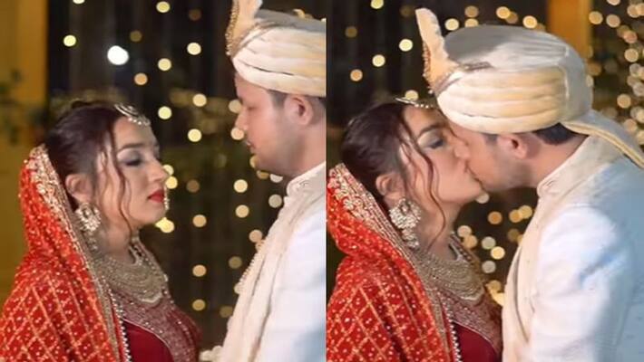 bride and groom lip kiss in front of photographer NTP bride and groom lip kiss in front of photographer NTP