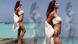 Disha Patani flaunts bikini body in white bralette drb