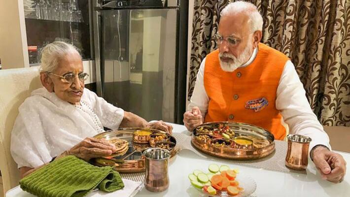 PM Modi told 1st time mother Heeraben not one or two, dozens of good habits kpg PM Modi told 1st time mother Heeraben not one or two, dozens of good habits kpg