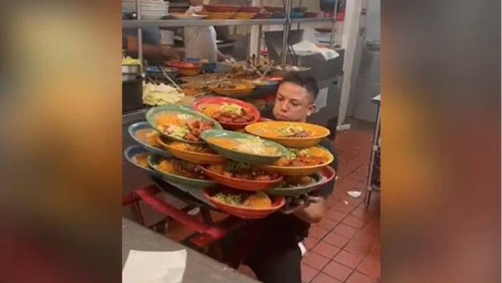 Waiter Lifts Over Dozen Plates, Internet Demands Raise For Him Waiter Lifts Over Dozen Plates, Internet Demands Raise For Him