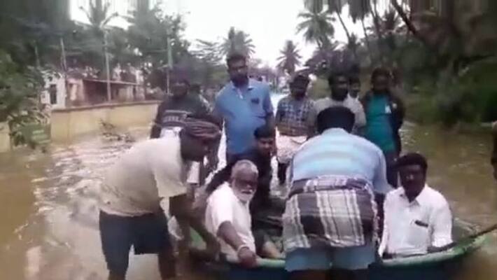 MLA N Mahesh uses boat to travel one km in 1 feet deep water netizens calls it hillarious MLA N Mahesh uses boat to travel one km in 1 feet deep water netizens calls it hillarious
