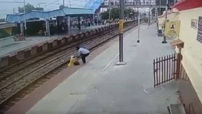woman crossing railway track saved in nick of time by alert staffer ash woman crossing railway track saved in nick of time by alert staffer ash