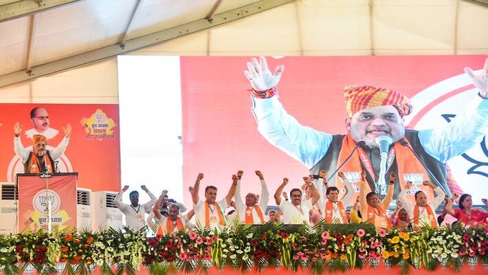 Amit Shah takes on Rahul Gandhi over Bharat Jodo Yatra, Home minister addressed rally in Rajasthan, DVG Amit Shah takes on Rahul Gandhi over Bharat Jodo Yatra, Home minister addressed rally in Rajasthan, DVG