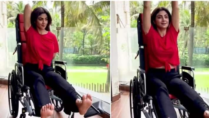 Shilpa Shetty performs yoga asanas with an injured leg on a wheelchair Shilpa Shetty performs yoga asanas with an injured leg on a wheelchair