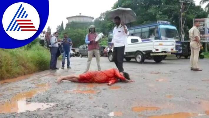 social worker nithyananda Olakadu rolled on pothole roads to demand Pm Modi visit to Udupi gow social worker nithyananda Olakadu rolled on pothole roads to demand Pm Modi visit to Udupi gow