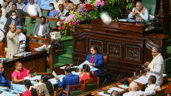 CM Basavaraj Bommai pulls Siddaramaiah's leg during Karnataka monsoon session CM Basavaraj Bommai pulls Siddaramaiah's leg during Karnataka monsoon session