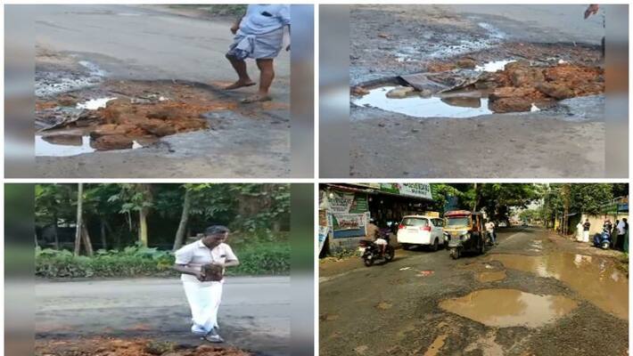 Bike rider injured after falling into pothole in Aluva Perumbavur Road Bike rider injured after falling into pothole in Aluva Perumbavur Road