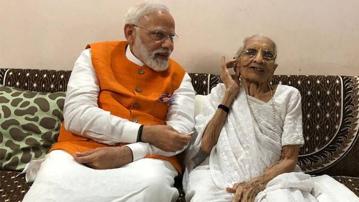 PM Modi meets mother Heeraben Modi at Gandhinagar residence after 2nd phase Gujarat election campaign ckm PM Modi meets mother Heeraben Modi at Gandhinagar residence after 2nd phase Gujarat election campaign ckm