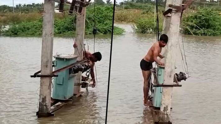 Lineman in Karnataka braves flood to switch on transformer, provide drinking water to marooned villages AJR Lineman in Karnataka braves flood to switch on transformer, provide drinking water to marooned villages AJR