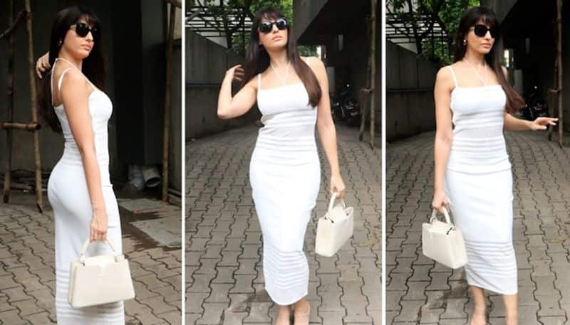 Pictures and Video: Nora Fatehi looks voluptuous in sexy ivory
