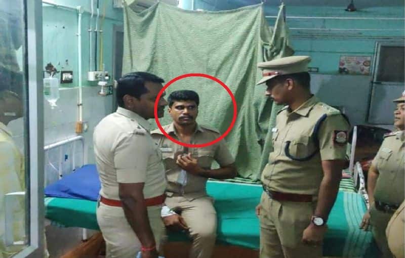 bjp party members attacked the police inspector at kovilpatti
