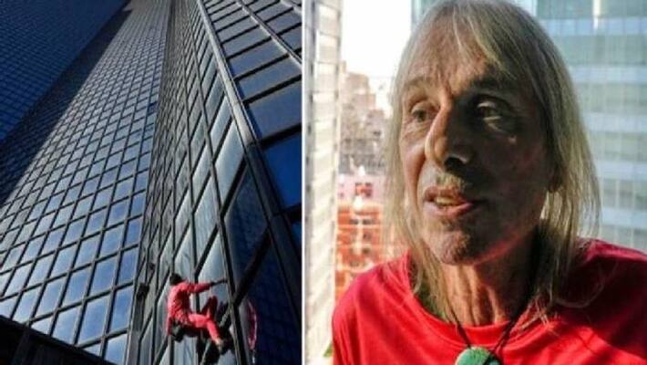French Spider man climbs 48 storey building French Spider man climbs 48 storey building