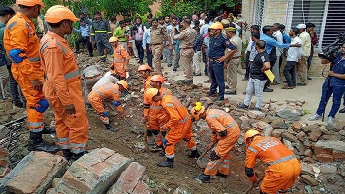 several feared dead as boundary Wall collapses in Noida Sector 21 several feared dead as boundary Wall collapses in Noida Sector 21