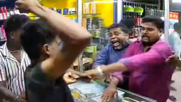 A CCTV footage of a youth being beaten up in a dispute over two-wheeler parking near Avadi A CCTV footage of a youth being beaten up in a dispute over two-wheeler parking near Avadi