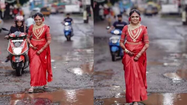 Kerala bride walks along pothole riddled road Kerala bride walks along pothole riddled road
