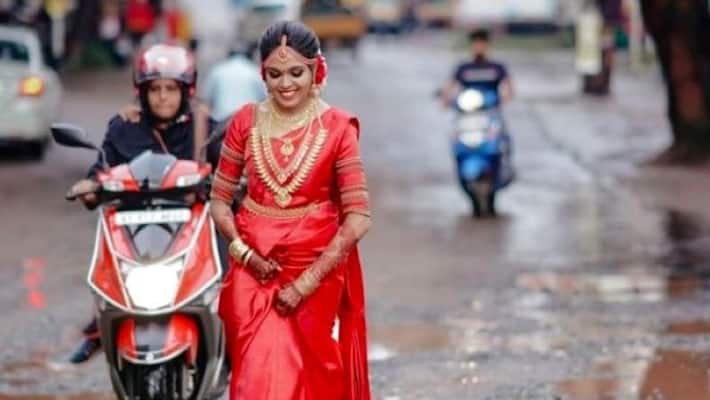 Bridal photoshoot Walks On Road Full Of Potholes in kerala video goes viral apa Bridal photoshoot Walks On Road Full Of Potholes in kerala video goes viral apa