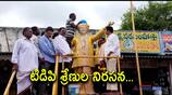 TDP Leaders Milk bath to NTR statue in Kanchikacharla 