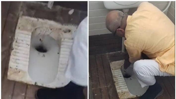 BJP MP Janardan Mishra cleans toilet with bare hands BJP MP Janardan Mishra cleans toilet with bare hands