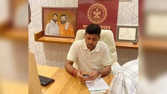 CM's son in Chief Minister's chair, video game.. Shocking photo released... Opposition parties Criticized. CM's son in Chief Minister's chair, video game.. Shocking photo released... Opposition parties Criticized.