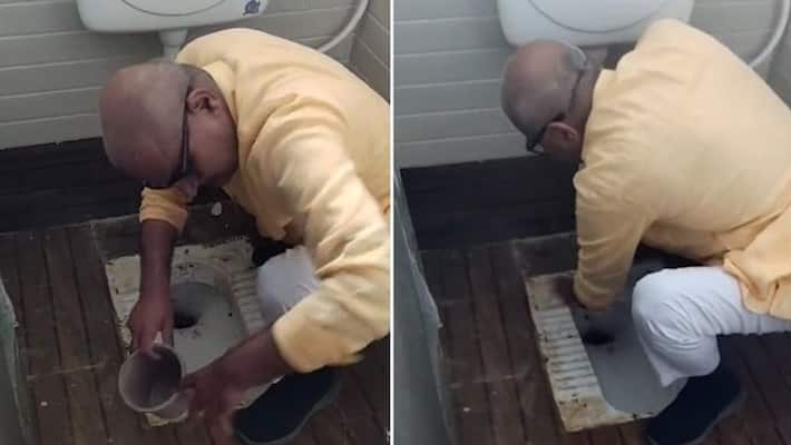 BJP MP cleans Madhya Pradesh school toilet with bare hands video goes viral watch gcw BJP MP cleans Madhya Pradesh school toilet with bare hands video goes viral watch gcw