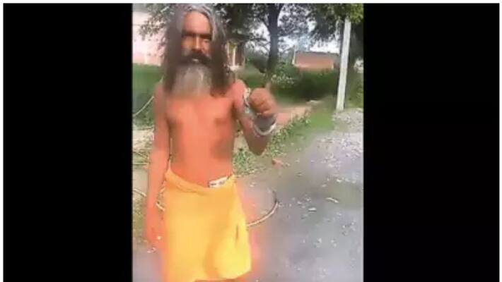 Sadhu posing for reel bitten by snake Sadhu posing for reel bitten by snake