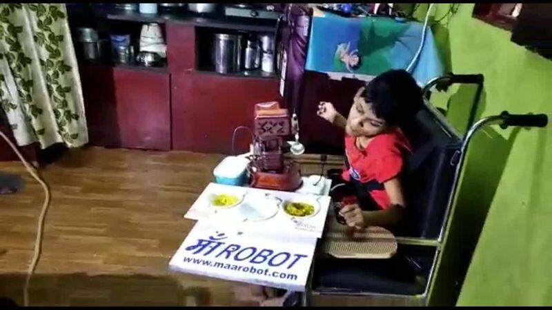Goan father builds robot feeding special child 