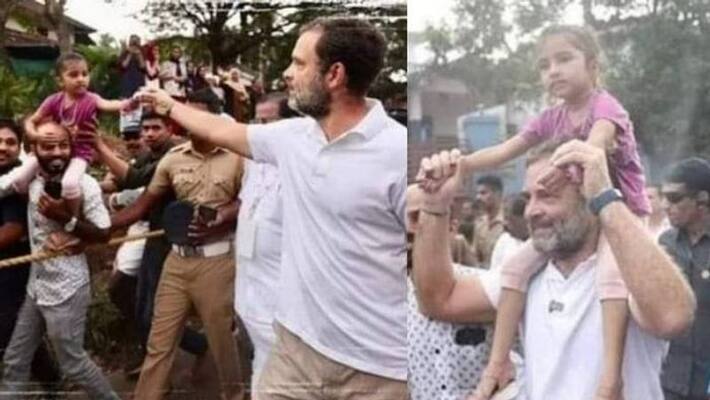 Viral photo of a girl sit in the shoulder of Rahul Gandhi in Bharat Jodo Yatra Viral photo of a girl sit in the shoulder of Rahul Gandhi in Bharat Jodo Yatra